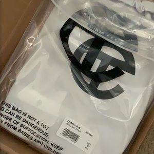 Telfar small Tan shopping bag.